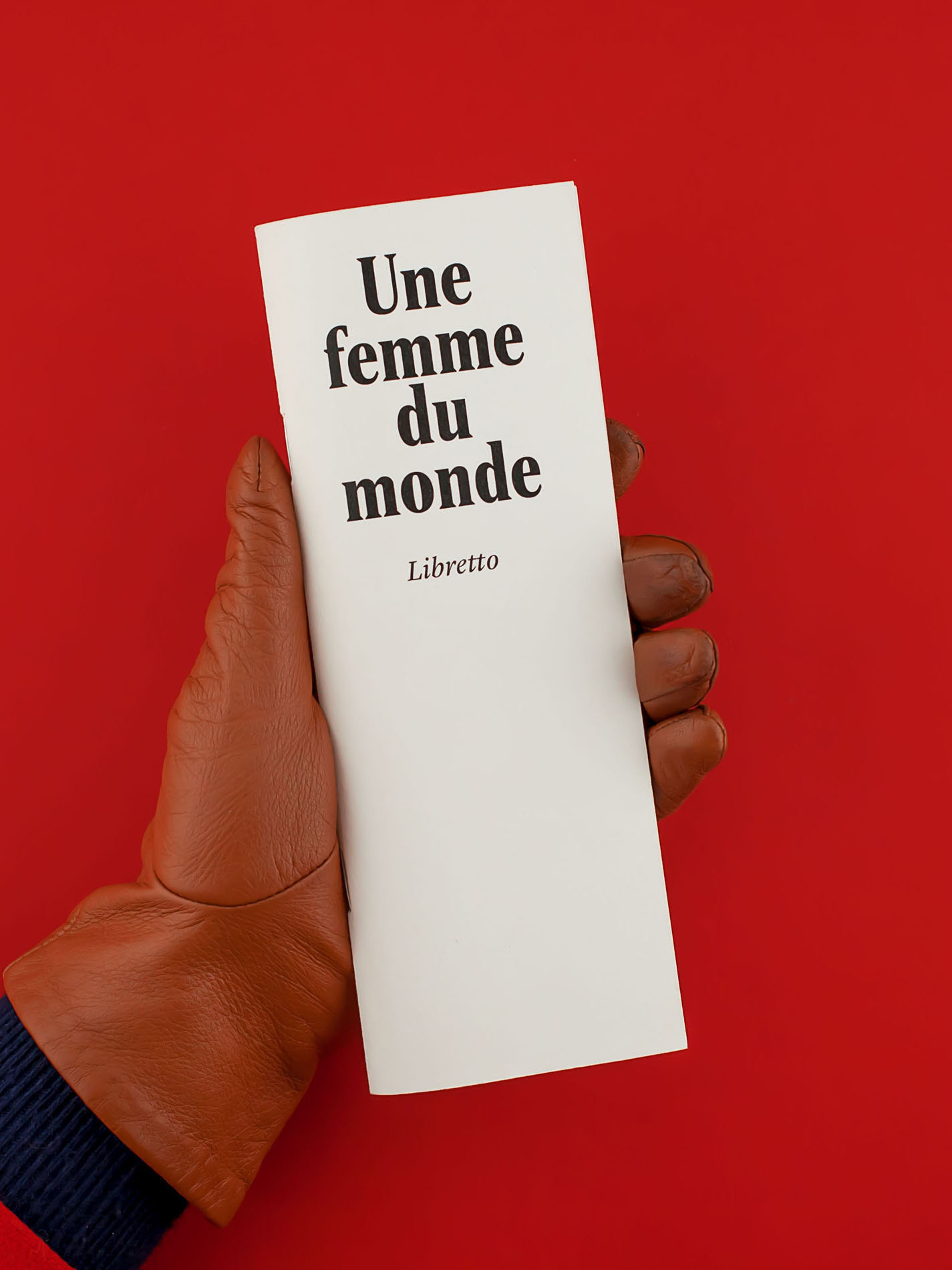 Libretto Une femme du monde